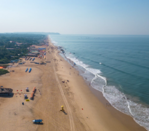 Explore the lively Calangute Beach with a taxi in Candolim and enjoy water sports and beach shacks